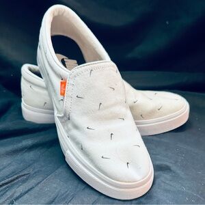 Nike White Slip-On Sneakers with Orange Accent